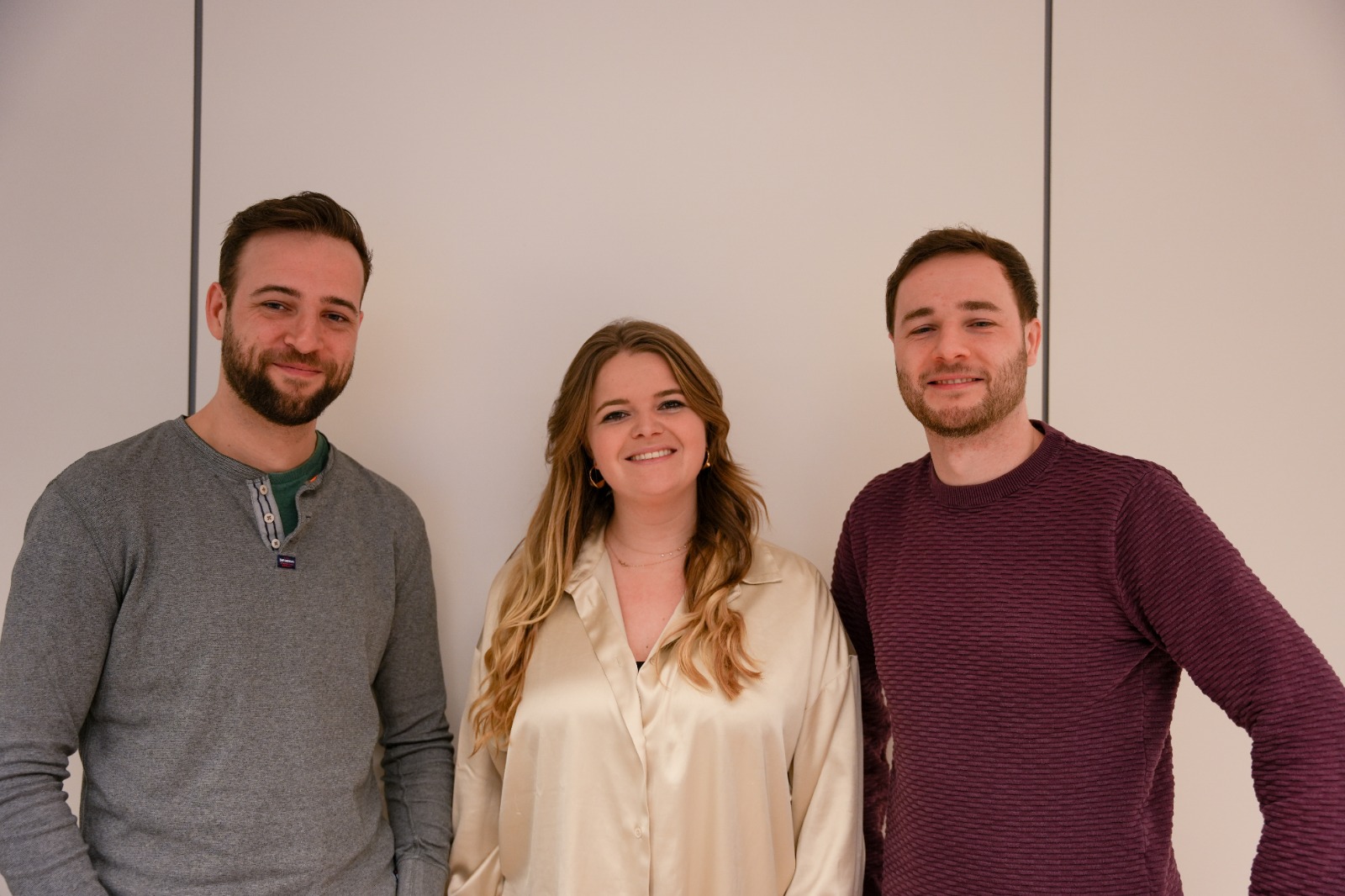 Lieselotte pictured with two clients after successful hair transplant inlets.
