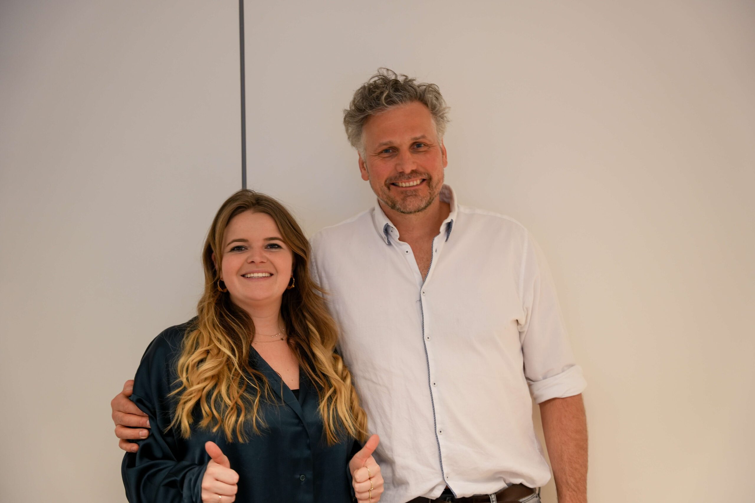 Lieselotte with client after successful DHI hair transplant.